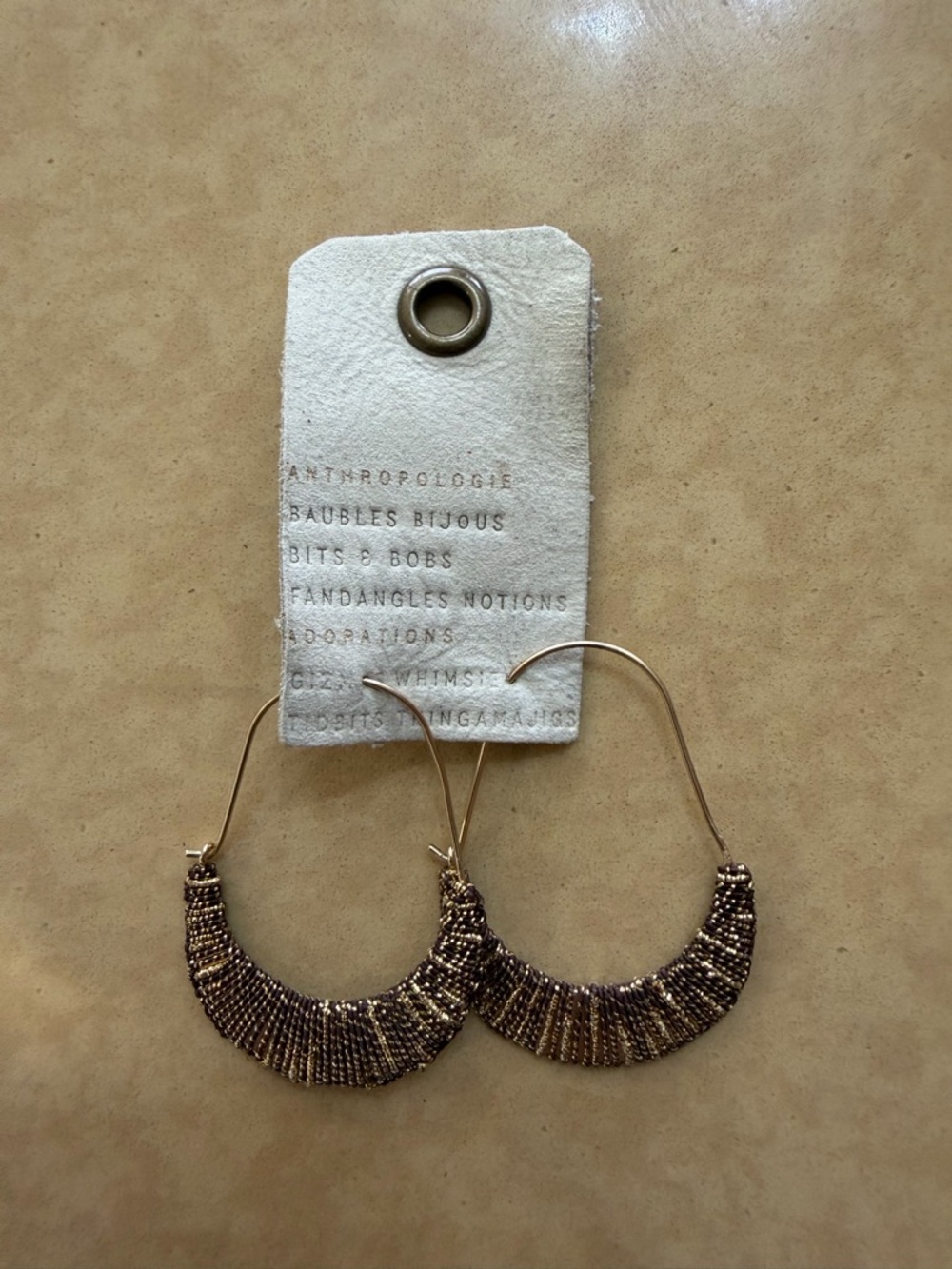 Anthropologie Gold and Brown Textured Crescent Hoop Earrings